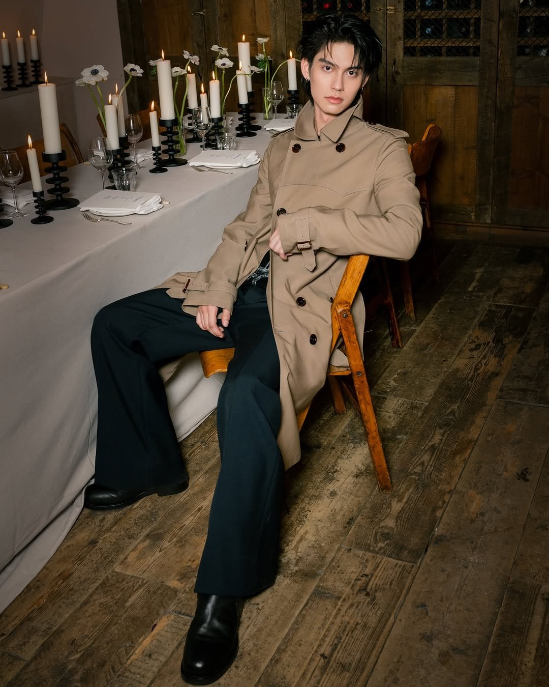 Photo shared by BRIGHT on March 08, 2026 tagging @burberry. May be an image of one or more people, makeup, duffle coat, overcoat, magazine, bolo tie and text.