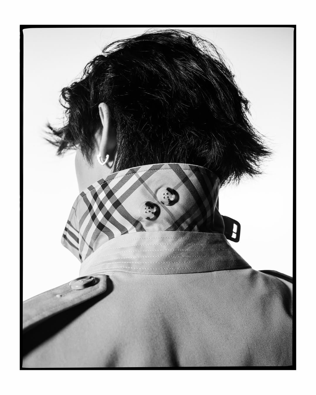 Photo shared by BRIGHT on March 02, 2026 tagging @timwalker, and @burberry. May be a black-and-white image of top, bolo tie, magazine and text.