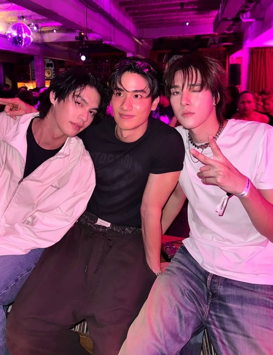 Photo shared by BRIGHT on December 12, 2025 tagging @tawan_v, and @hirunkit_. May be an image of one or more people, bangs, top and text.