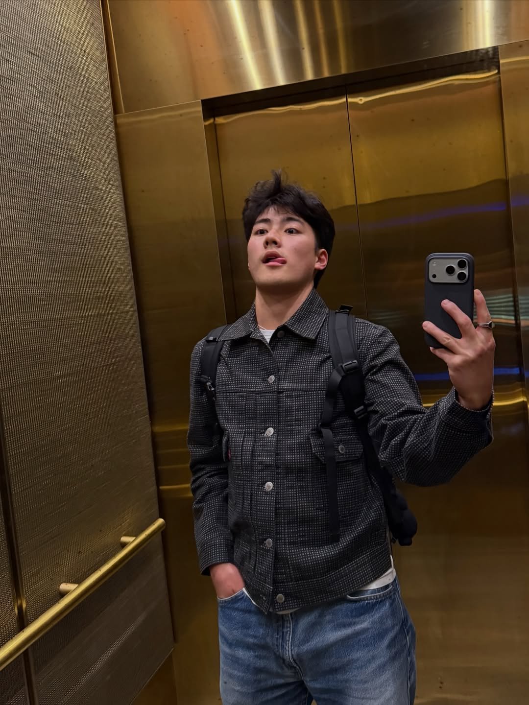 Photo by Brian Jung on April 02, 2026. May be a selfie of one or more people, phone, mirror and text.