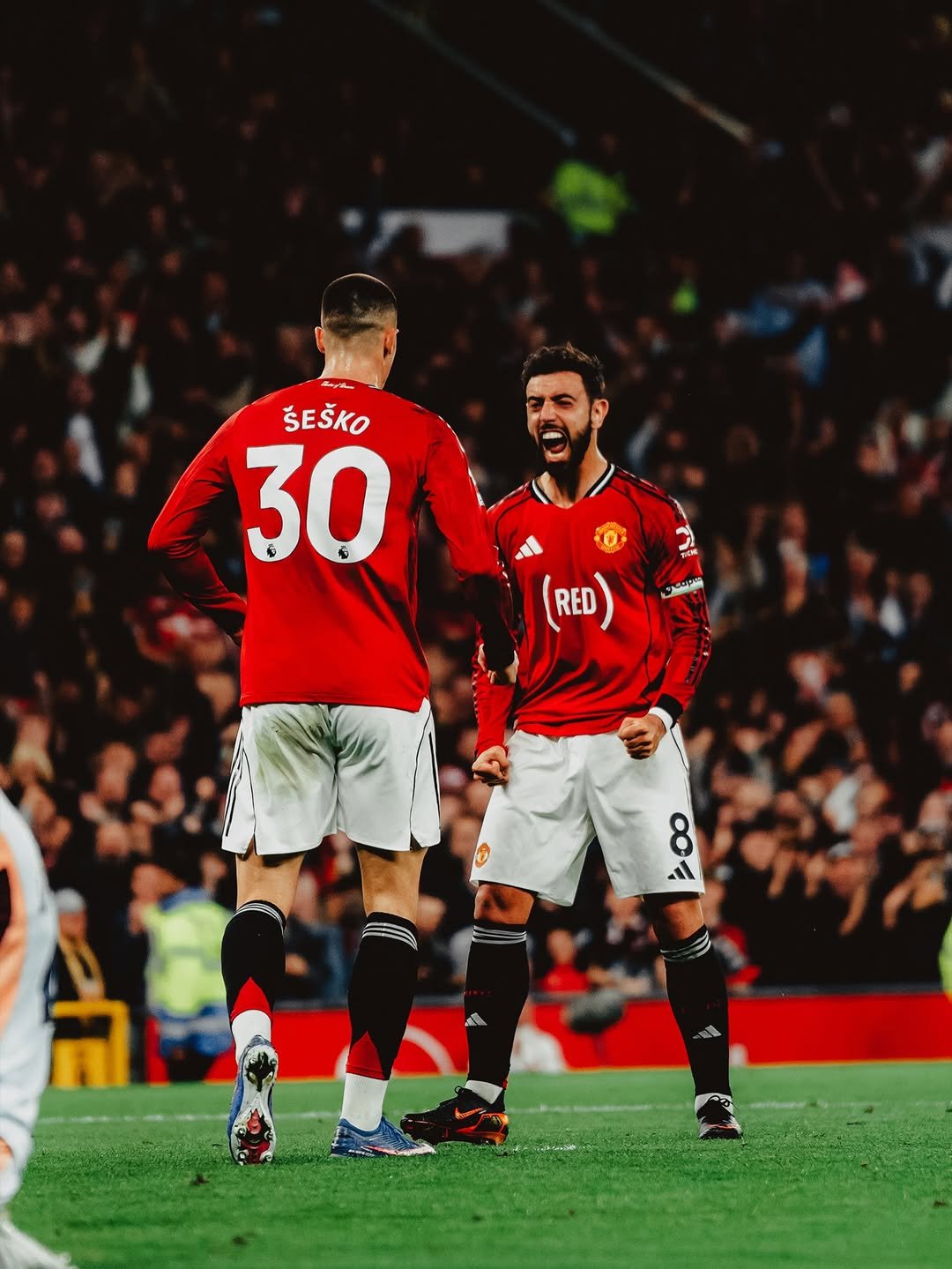 Photo shared by Bruno Fernandes on April 27, 2026 tagging @benjaminsesko. May be an image of ‎football, soccer, cleats, ball, stadium and ‎text that says '‎ŠEŠKO 30 (RED) RED 8 له‎'‎‎.
