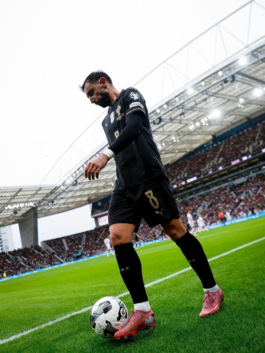 Photo shared by Bruno Fernandes on November 16, 2025 tagging @portugal. May be an image of football, soccer, stadium and text.