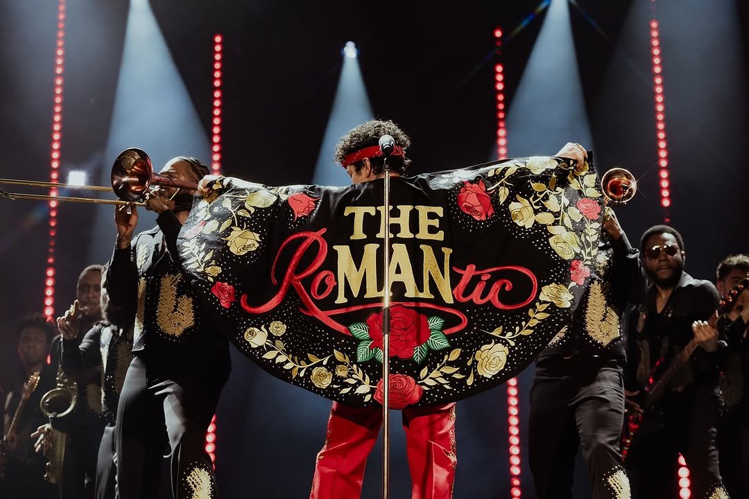 Photo by Bruno Mars on April 16, 2026. May be an image of tambourine, poster, concert and text that says 'RoMANTO ROMAN TΙHΕ MANtiO MAN'.