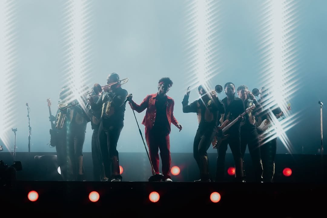 Photo by Bruno Mars on April 19, 2026. May be an image of saxophone, concert and text.