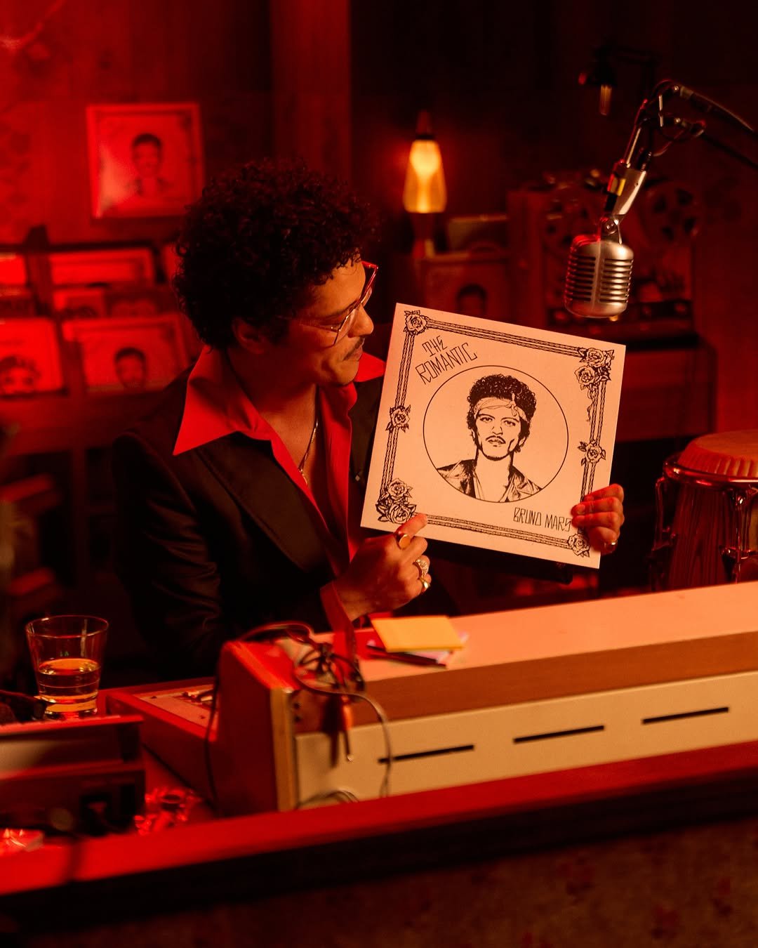 Photo by Bruno Mars on March 08, 2026. May be pop art of poster, telephone and text.