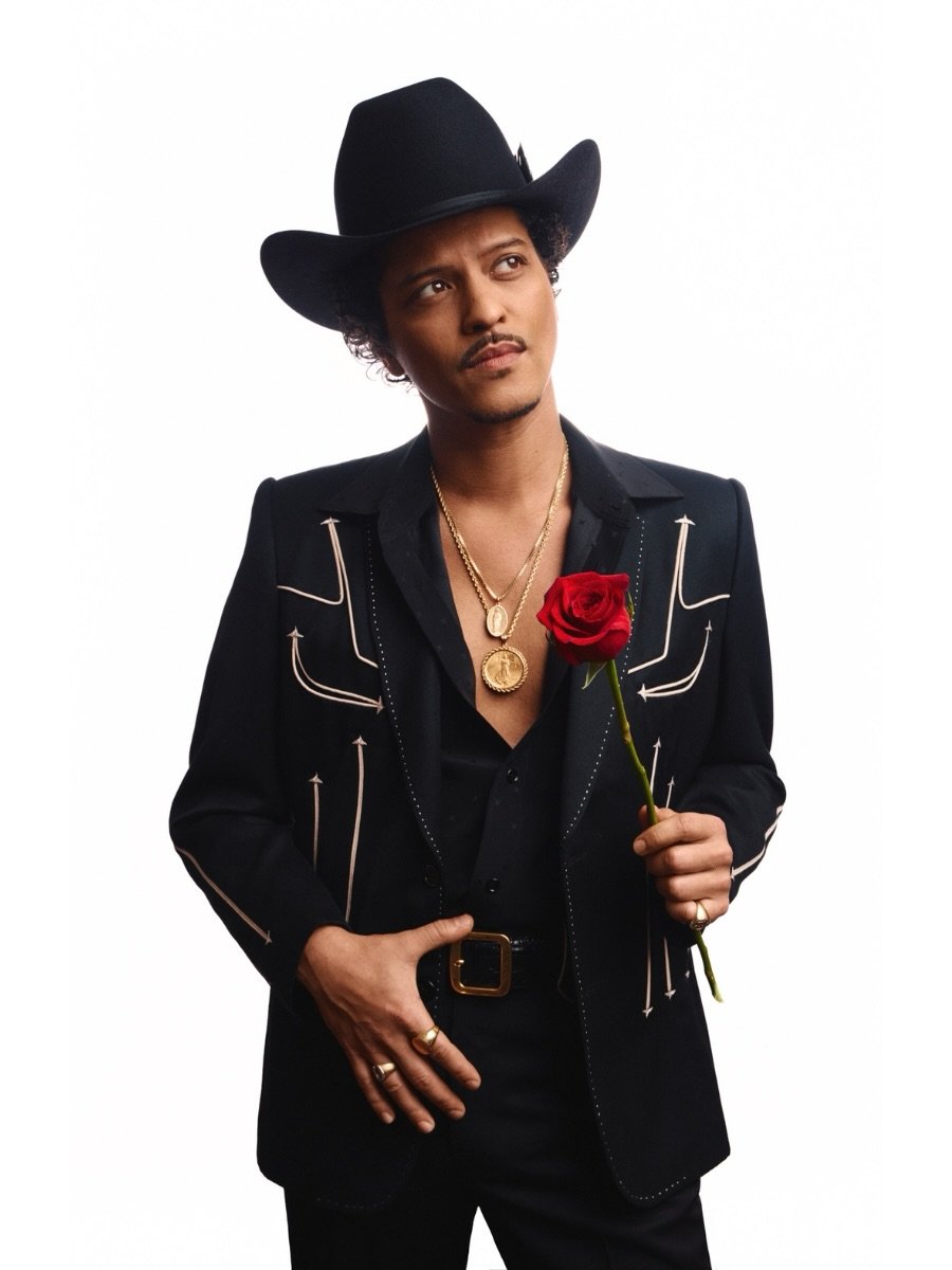 Photo shared by Stetson on March 12, 2026 tagging @brunomars, and @rickyregal. May be an image of costume, bolo tie and text.