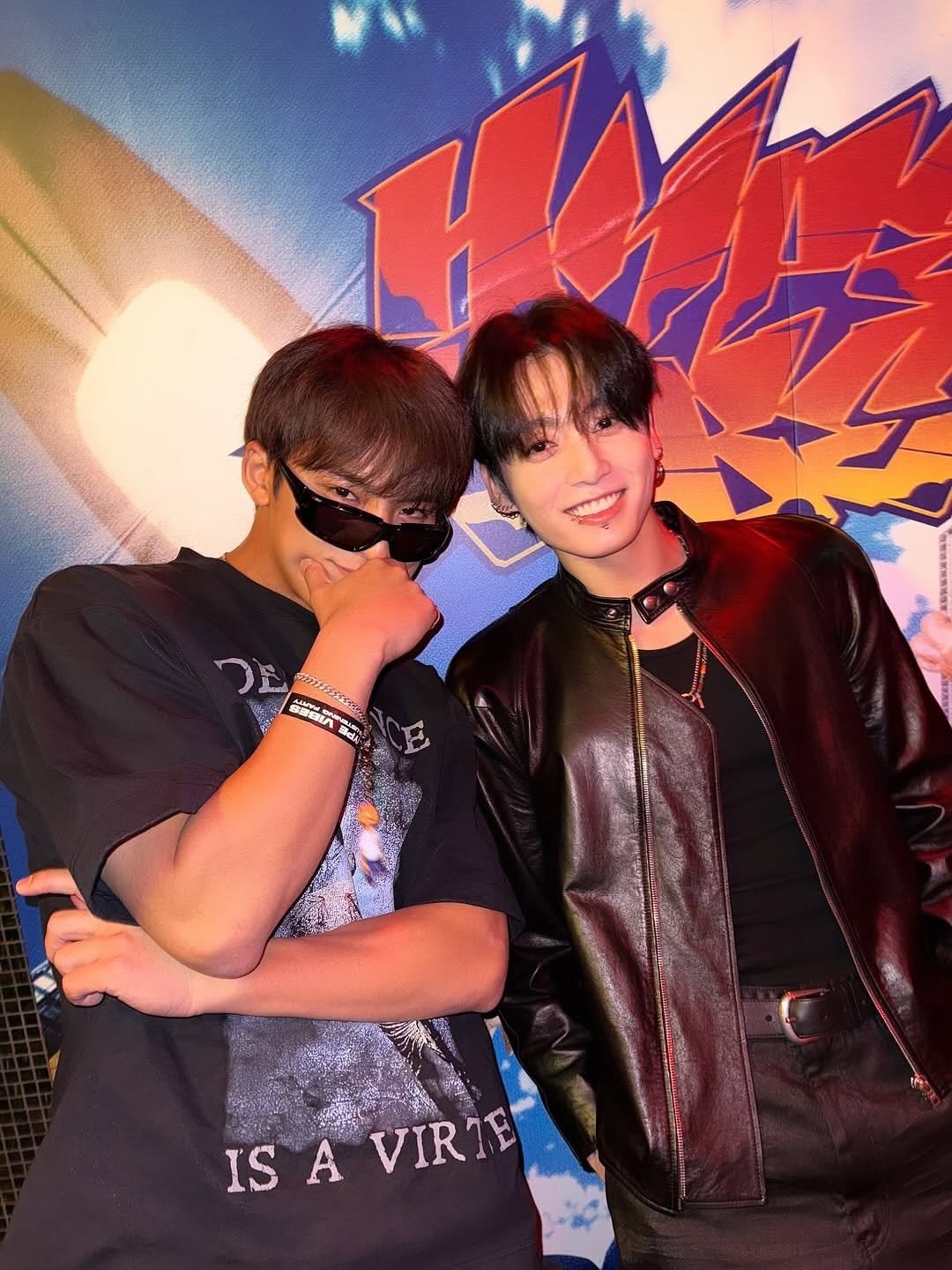 Photo shared by JUNGKOOK Updates on September 29, 2025 tagging @mnijunvgkook, @bts.bighitmusic, and @jungkook.bts.offlicial. May be an image of one or more people, bangs, bolo tie and text.