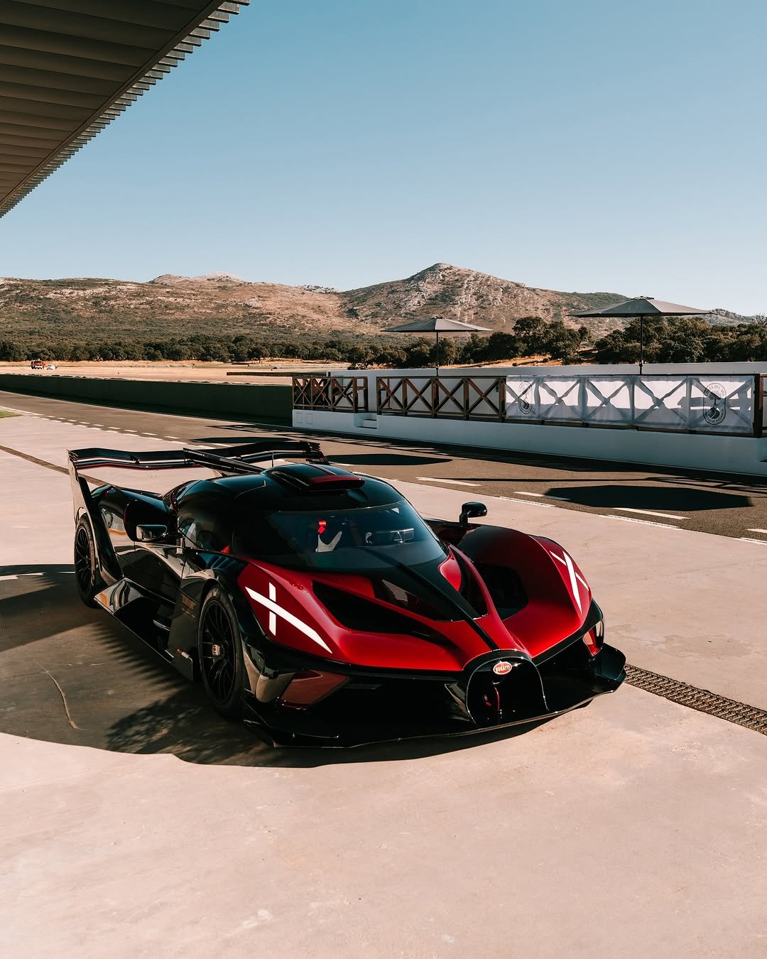 Photo shared by BUGATTI on October 04, 2025 tagging @ascari_club, and @concursodeeleganciacostadelsol. May be an image of racing vehicles, race car, wheel, roadster, road and text.