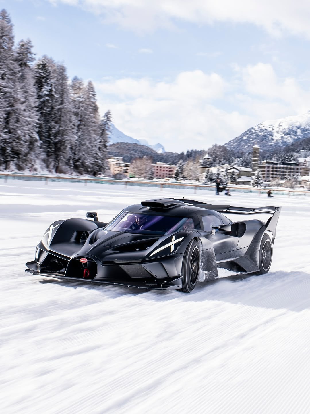 Photo shared by BUGATTI on February 03, 2026 tagging @theicestmoritz. May be an image of race car, wheel and text.