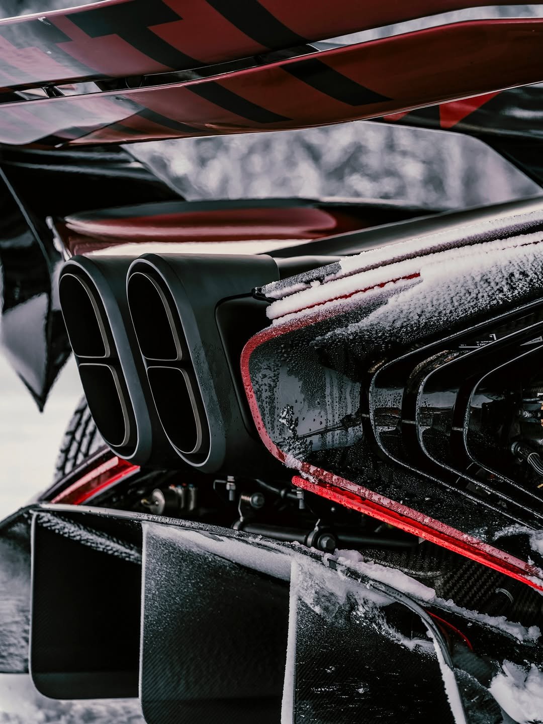 Photo shared by BUGATTI on February 05, 2026 tagging @tomjensfilms. May be an image of race car, tailpipe, wheel and text.