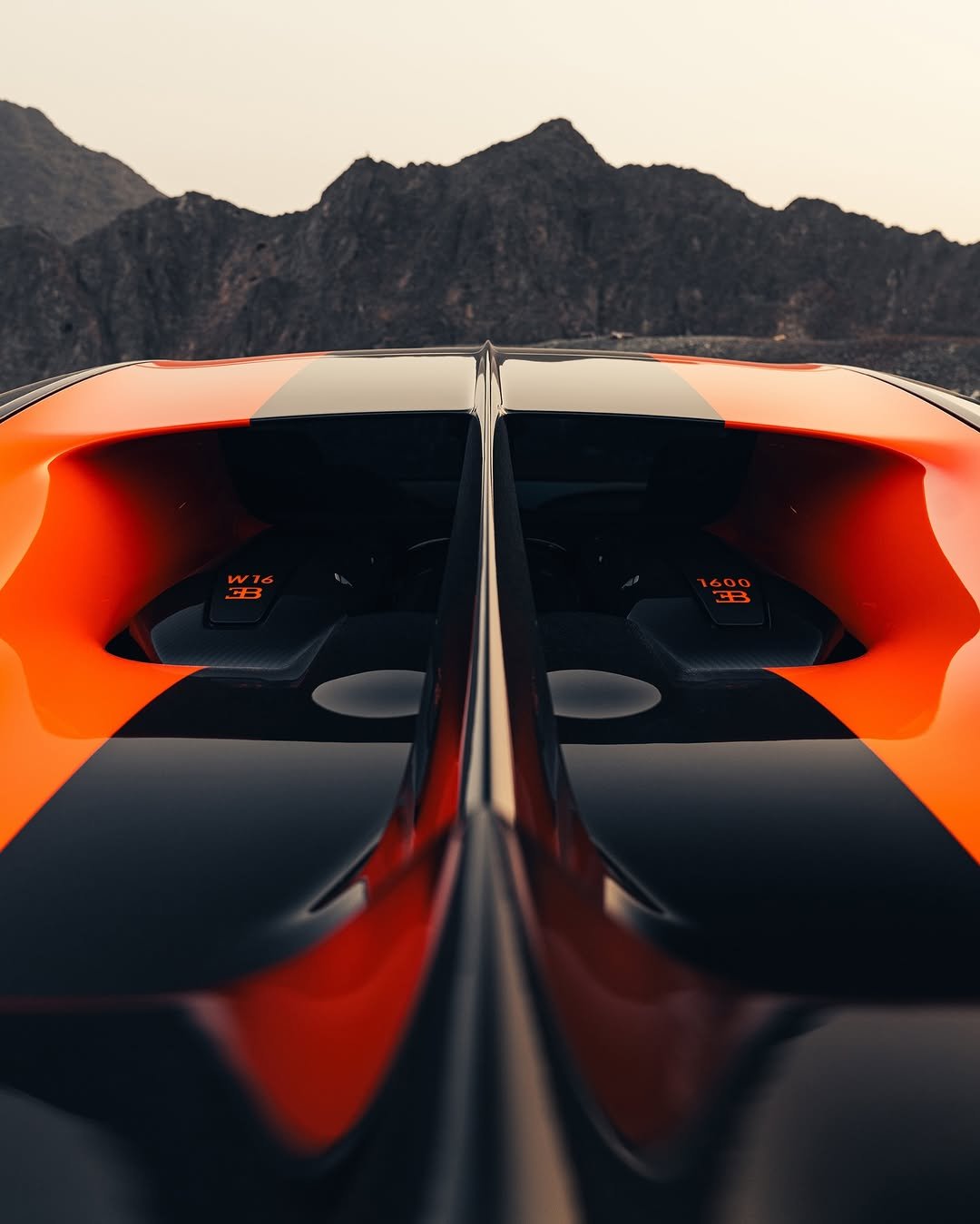 Photo shared by BUGATTI on November 01, 2025 tagging @f1rstmotors, and @fahiz.01. May be an image of rearview mirror, roadster, wheel, race car and text.