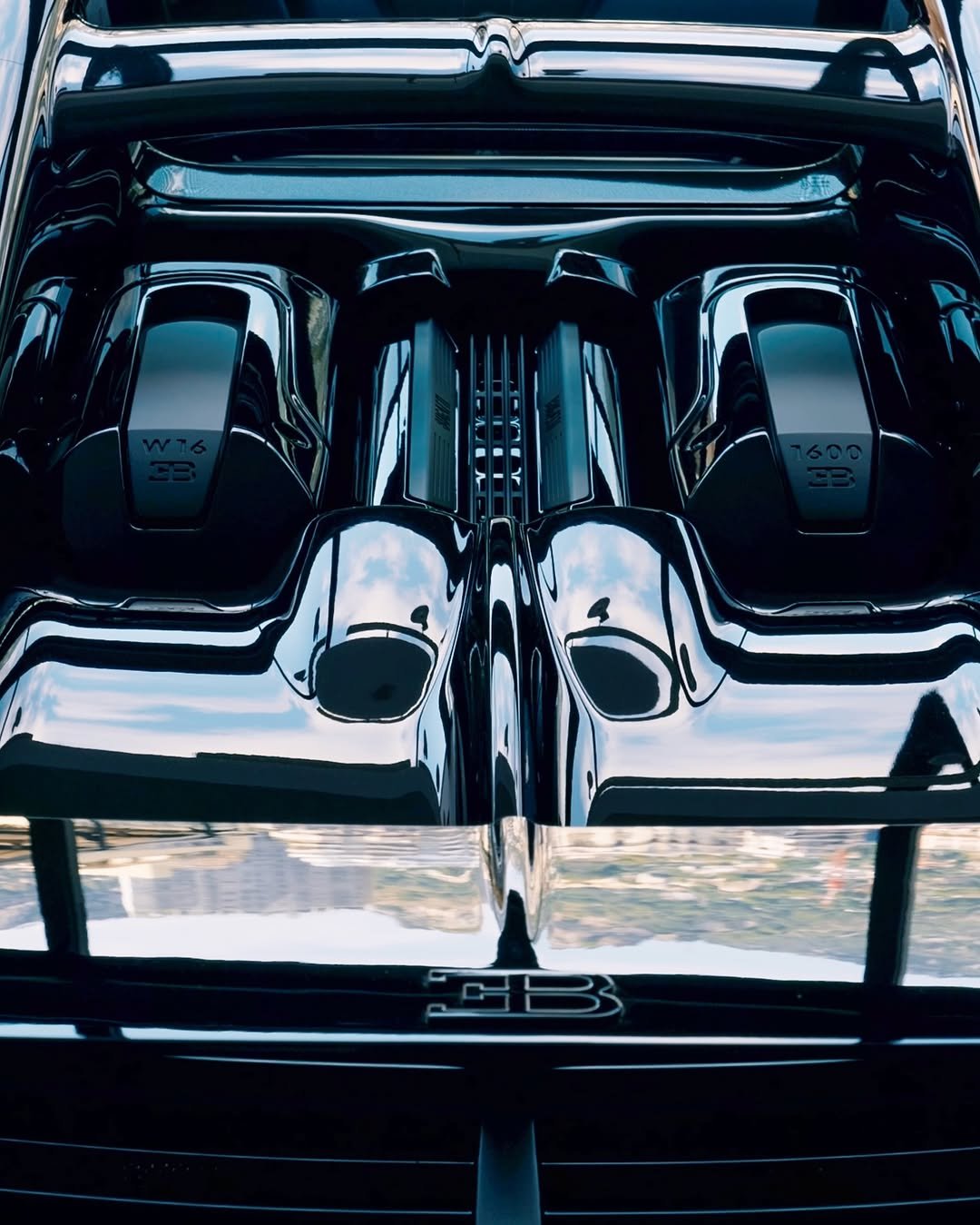 Photo by BUGATTI on November 13, 2025. May be an image of hood ornament, roadster, limousine and text.