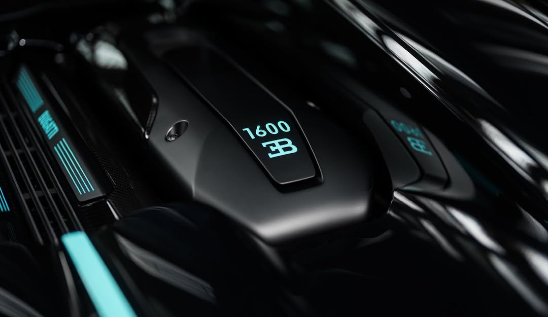 Photo shared by BUGATTI on February 19, 2026 tagging @bugatti.uae. May be an image of car, roadster, wheel and text that says '1600 모'.