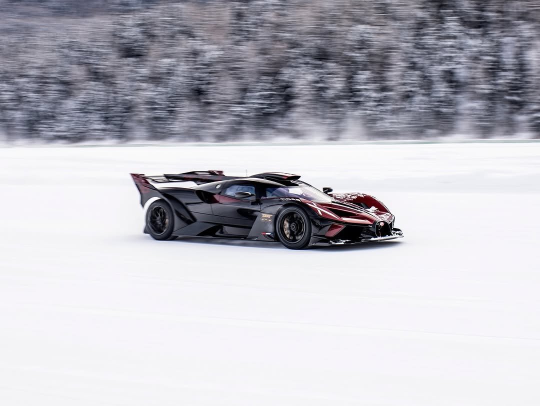 Photo shared by BUGATTI on February 01, 2026 tagging @theicestmoritz. May be an image of racing vehicles, race car, road and text.