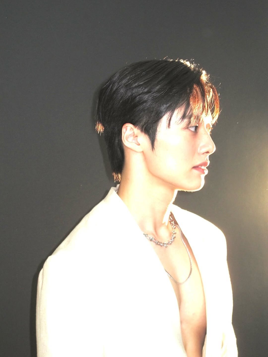 Photo by 조잽미 on June 09, 2025. May be an image of 1 person, bangs, bolo tie and text.