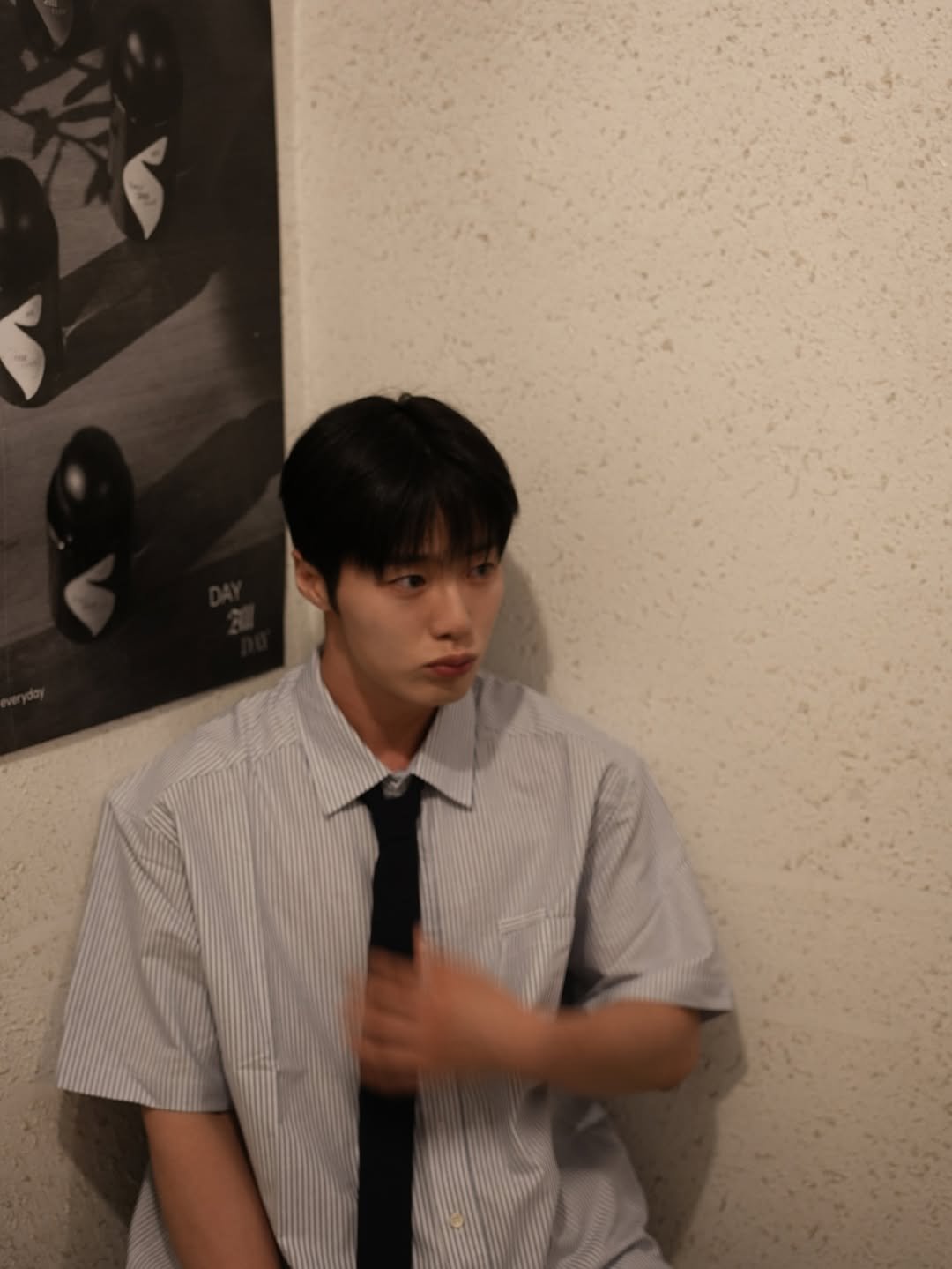 Photo by 조잽미 on June 14, 2025. May be an image of 1 person, hair, bolo tie and text.