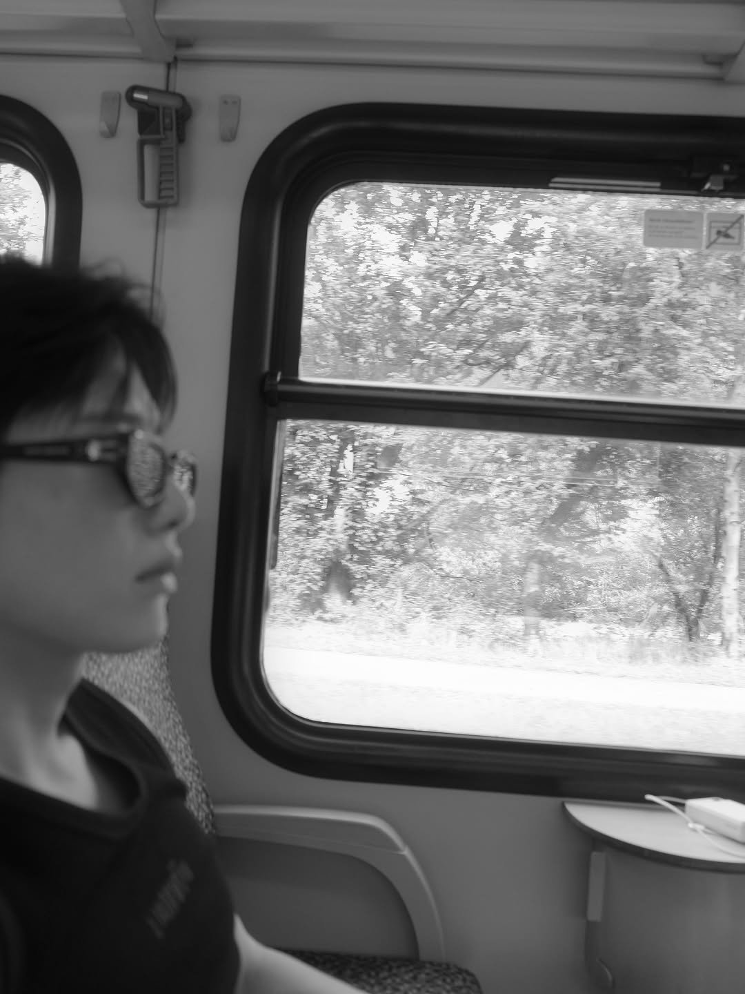 Photo shared by 조잽미 on July 20, 2025 tagging @visitaustria, and @mayrhofenimzillertal. May be a black-and-white image of 1 person, train, bus, window and text.