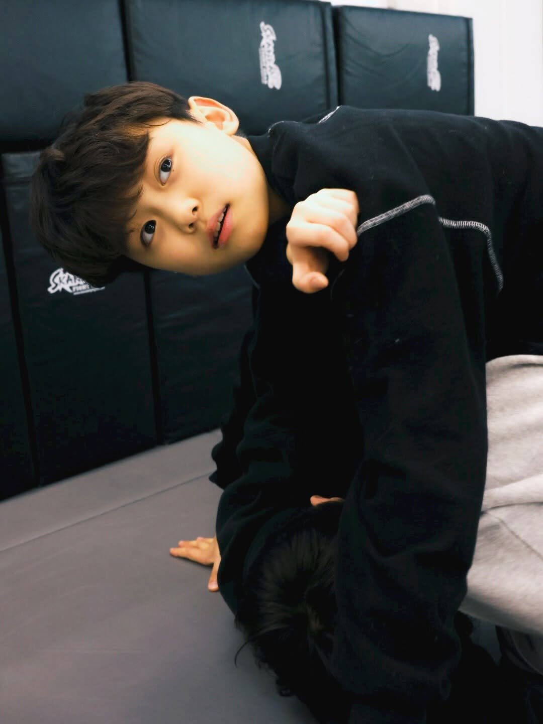 Photo shared by 버닝주짓수 on January 08, 2026 tagging @overlimit_gumi_burning, and @bjj_sso0oss_. May be an image of martial arts, mat, punching bag and text.