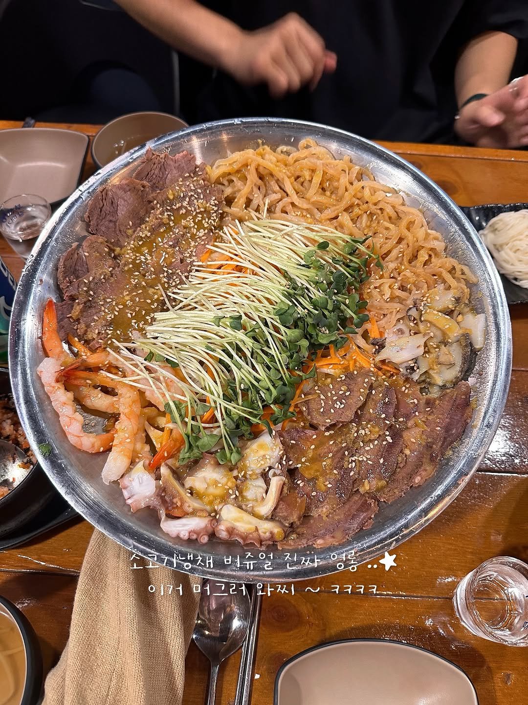 Photo by 주인장 on September 25, 2025. May be an image of 1 person, ramen, hot pot, noodles, grill and text.