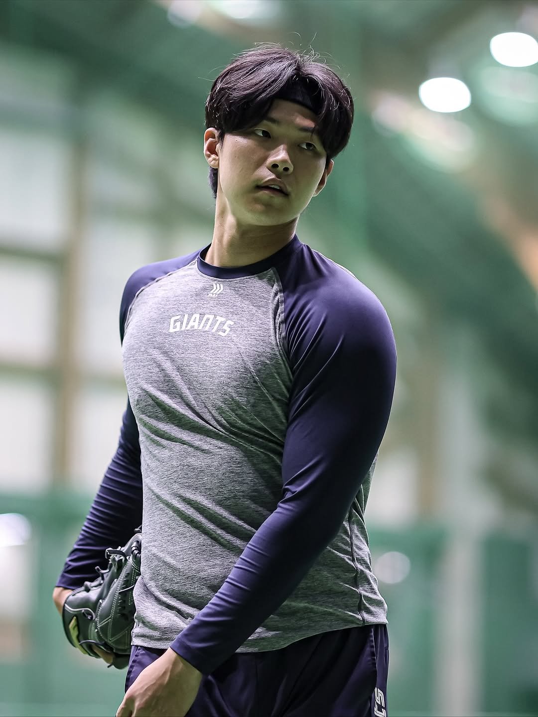 Photo by 롯데자이언츠 on November 11, 2025. May be an image of baseball, sportswear, sports equipment, top and text.