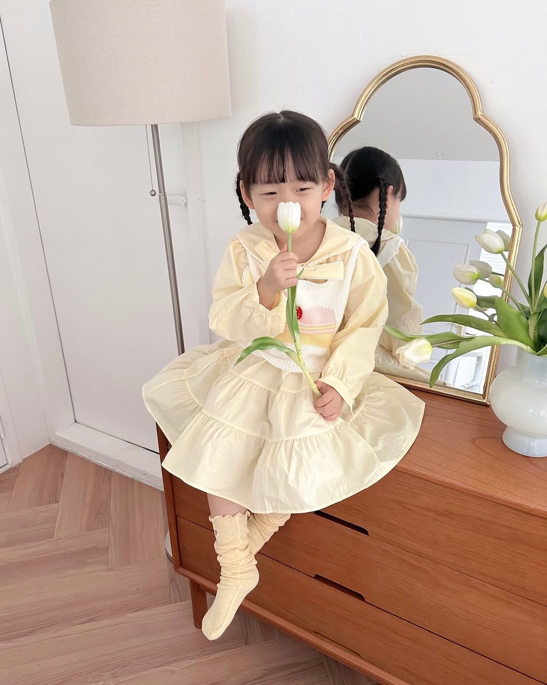 Photo by 버터베베 Do eunbi on February 15, 2026. May be an image of baby, sleepwear, dress and text.