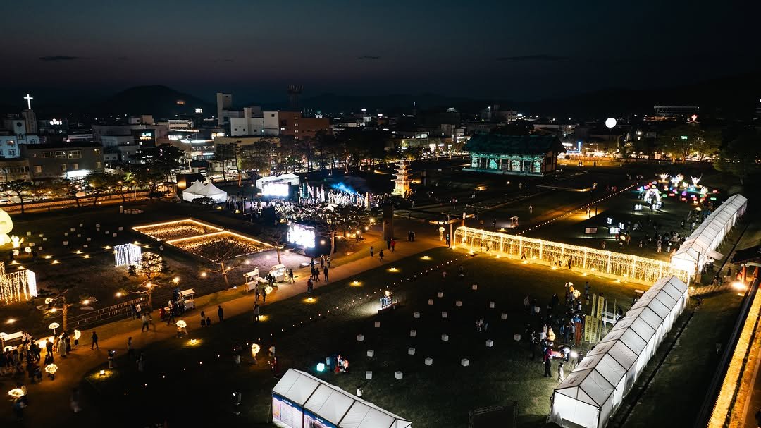 Photo by 2026 부여 국가유산 야행 on April 17, 2026. May be an image of twilight, night and text.