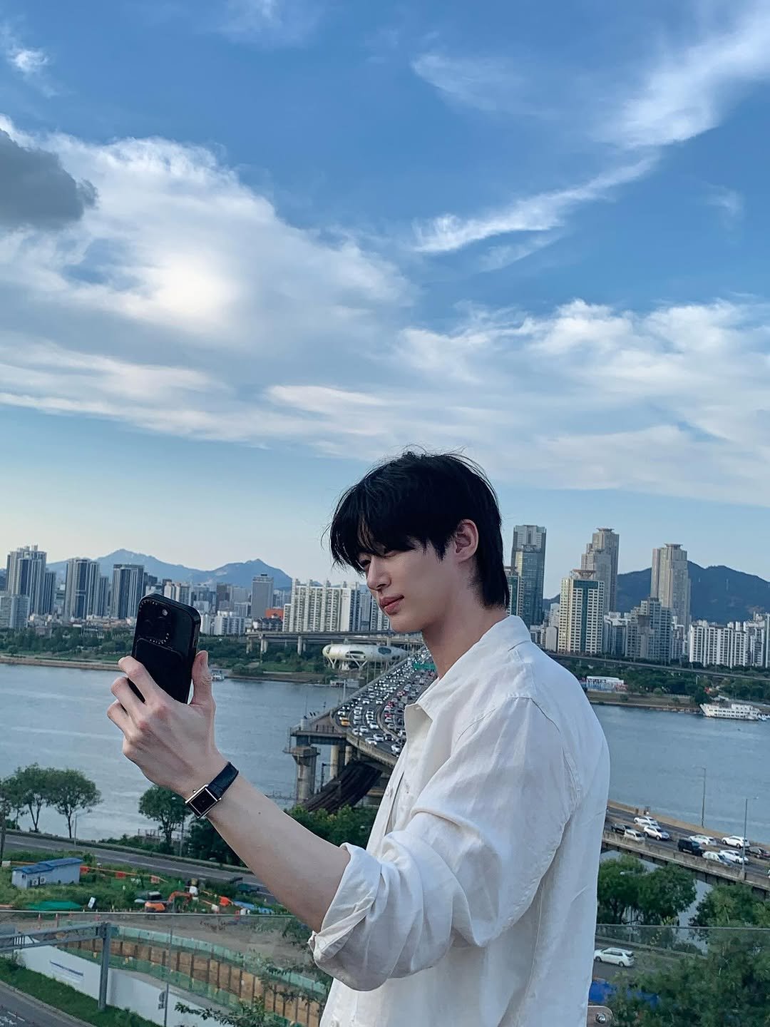 Photo by 변우석  Woo Seok Byeon on September 20, 2025. May be an image of 1 person, phone, outdoors and text.