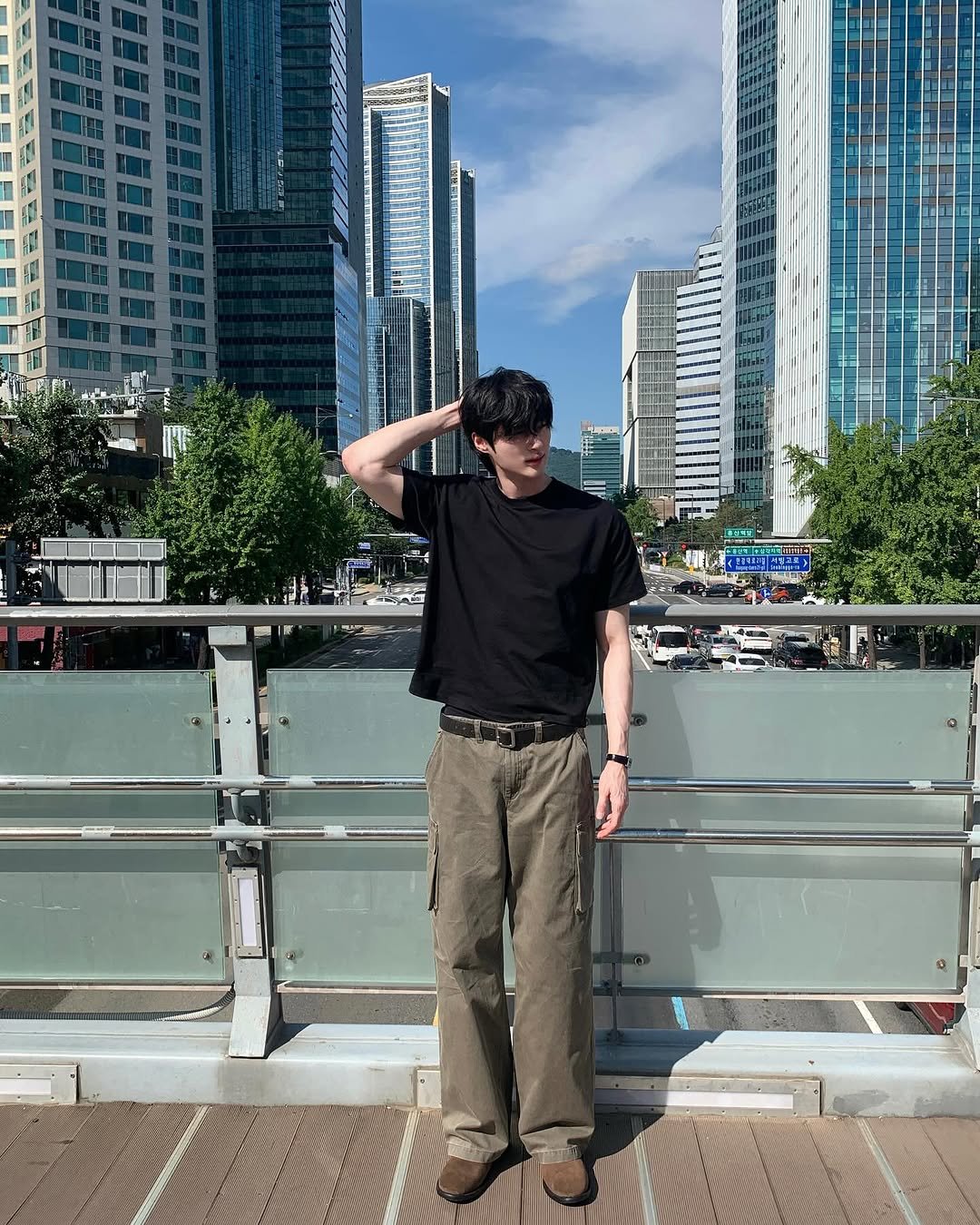 Photo by 변우석  Woo Seok Byeon on August 26, 2025. May be an image of wingtip shoes, skyscraper and bridge.