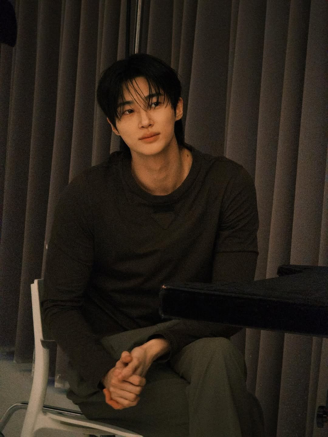 Photo shared by 변우석  Woo Seok Byeon on September 25, 2025 tagging @prada. May be an image of 1 person, bangs and text that says 'P'.