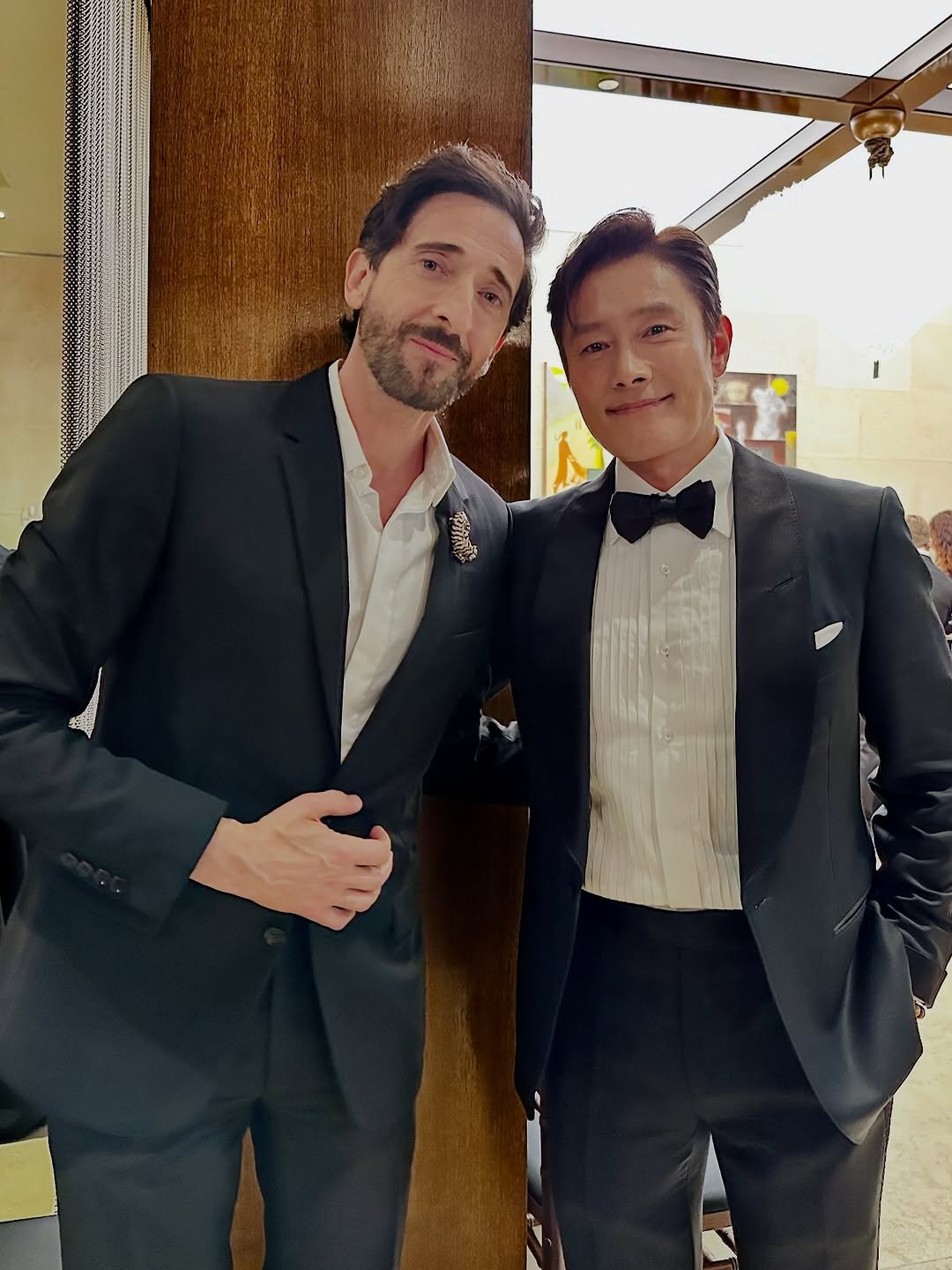 Photo by LeeByungHun 이병헌 on October 19, 2025. May be an image of one or more people, beard, dinner jacket, suit and text.