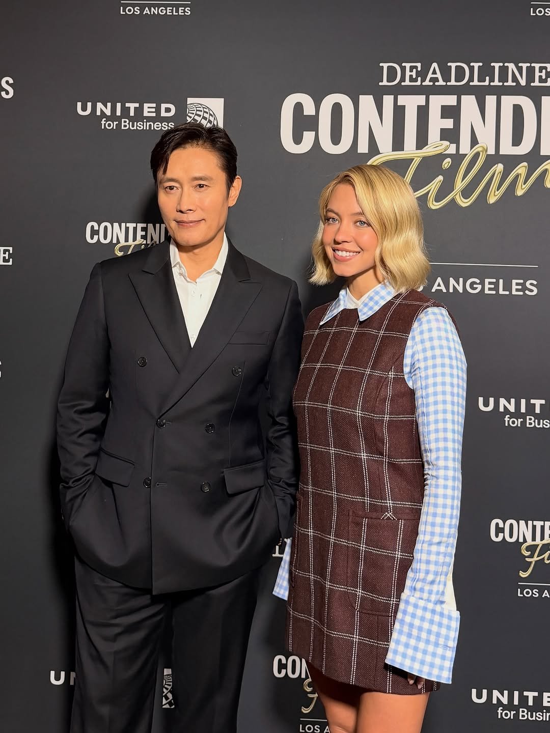 Photo by LeeByungHun 이병헌 on November 15, 2025. May be an image of dinner jacket, carpet and text that says 'LOS ANGELES S LOS UNITED for Business DEADLINE CONTENDI iln E CONTE C ANGELES UNIT for Bus CONTI F LOS U ហា CON UNIT for Busir'.