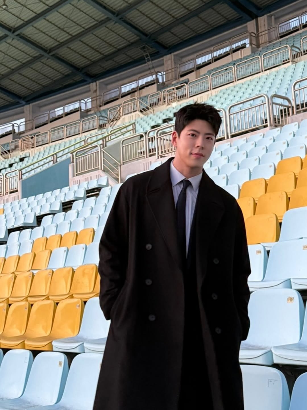 Photo by 최우성 on January 29, 2026. May be an image of one or more people, duffle coat, overcoat and text.