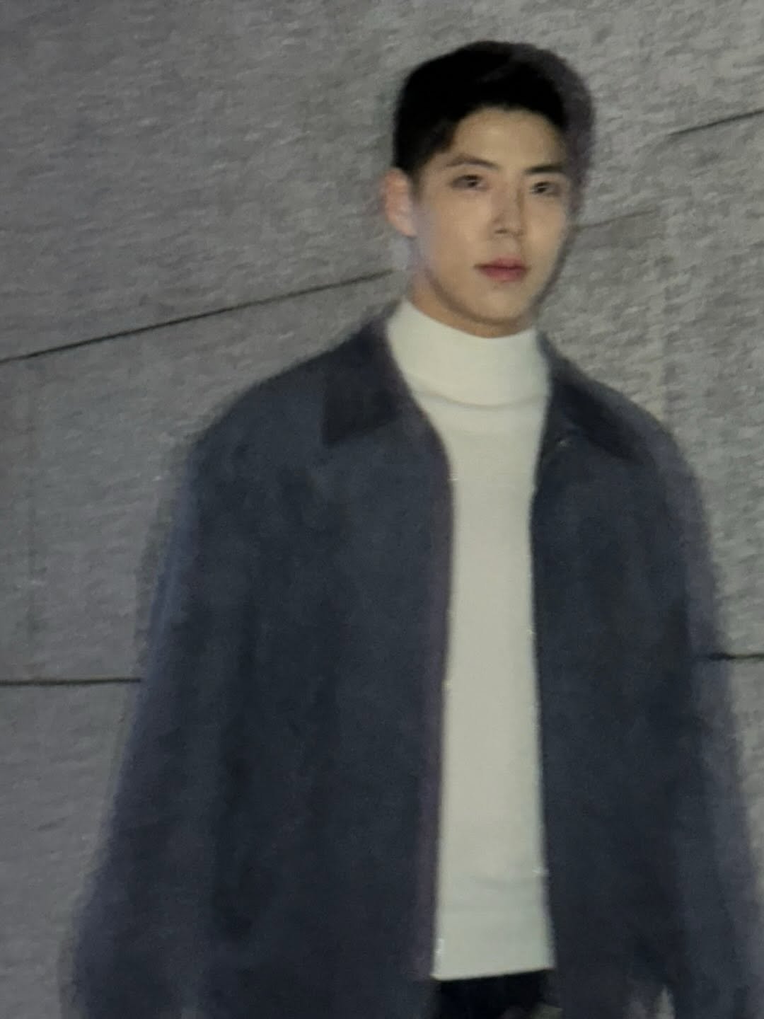Photo by 최우성 on January 18, 2026. May be an image of one or more people, bangs, goosedown coat, overcoat, duffle coat, turtleneck, parka, top and bolo tie.