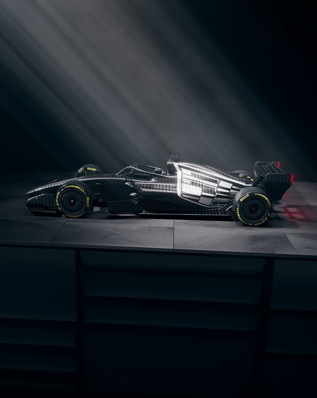 Photo shared by Cadillac on January 13, 2026 tagging @generalmotors, @generalmotorsdesign, @cadillacracingofficial, and @cadillacf1. May be an image of racing vehicles, race car and text.