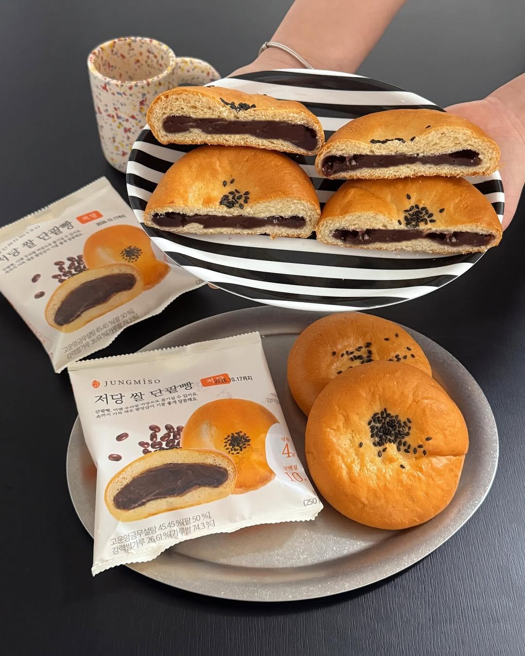 Photo shared by 카페 투어 : 𝚋𝚢 𝙹𝚒𝚖𝚗𝚒 on February 17, 2026 tagging @jungmiso_official. May be an image of pastry, sandwich, buns and text.