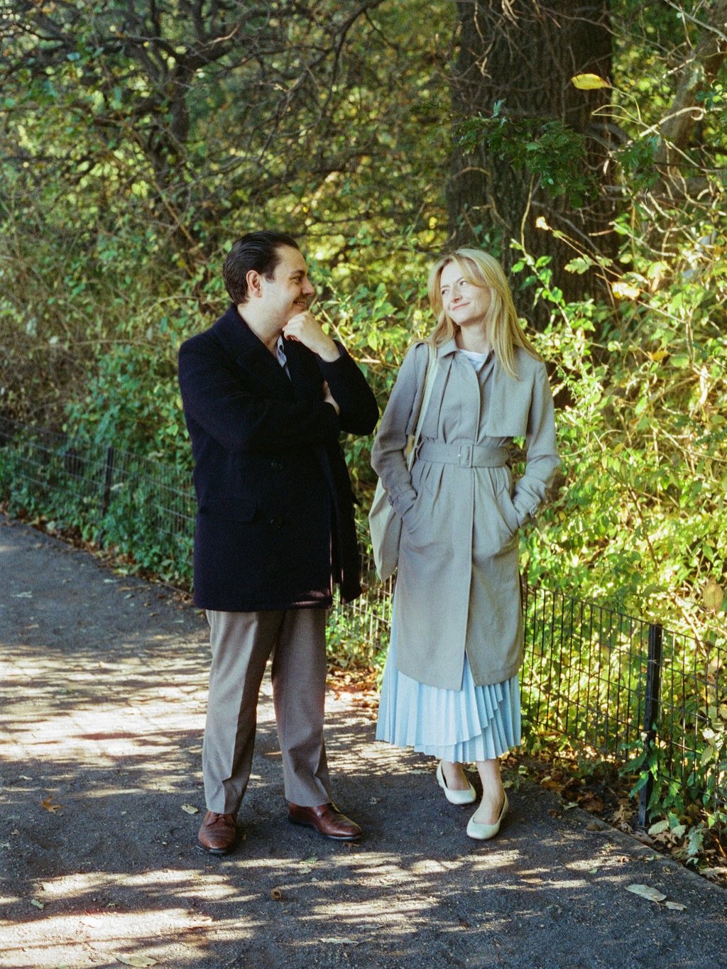 Photo shared by Caity Gyorgy on December 10, 2025 tagging @mark.limacher, @buckingjampalace, and @junecavlanfilm. May be an image of people kissing, overcoat, park and text.