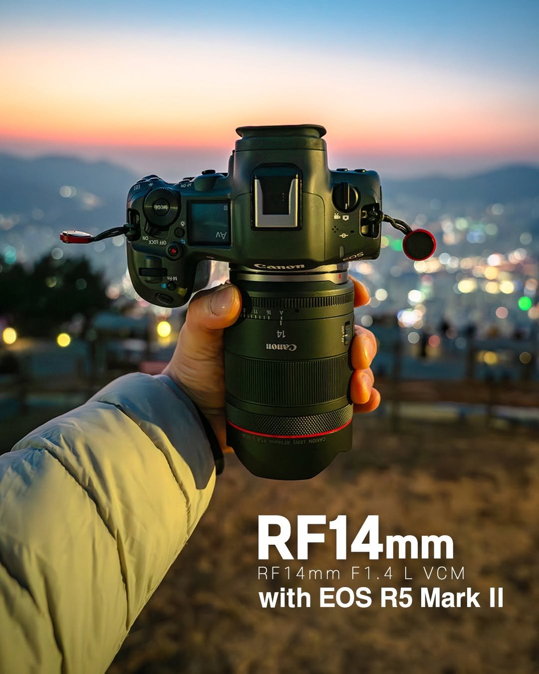 Photo by 캐논코리아 주식회사 on April 22, 2026. May be an image of camcorder, camera, outdoors and text that says '"အ01ဆ Canon นอน RF14 mm RF14mm RF14mmF1.4LVCM F1.4 LVCM with EOS R5 Mark withEOSR5Mark Il'.