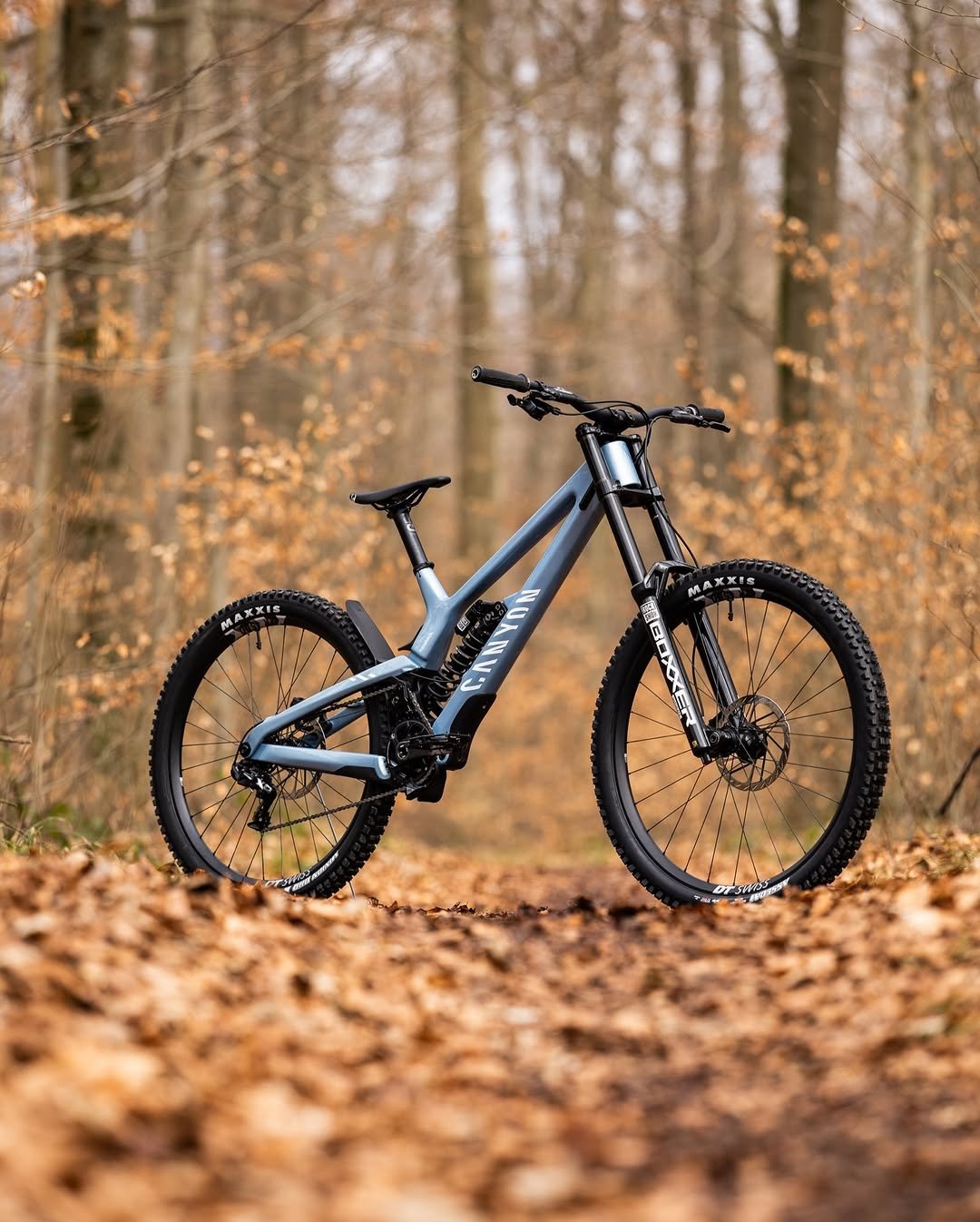 Photo shared by Canyon on November 24, 2025 tagging @troybrosnan, @fabienbarel, @luca_shaw, @marine_cabirou, @canyon_mtb, @henri_kiefer, and @alethaostgaard. May be an image of bicycle and text.