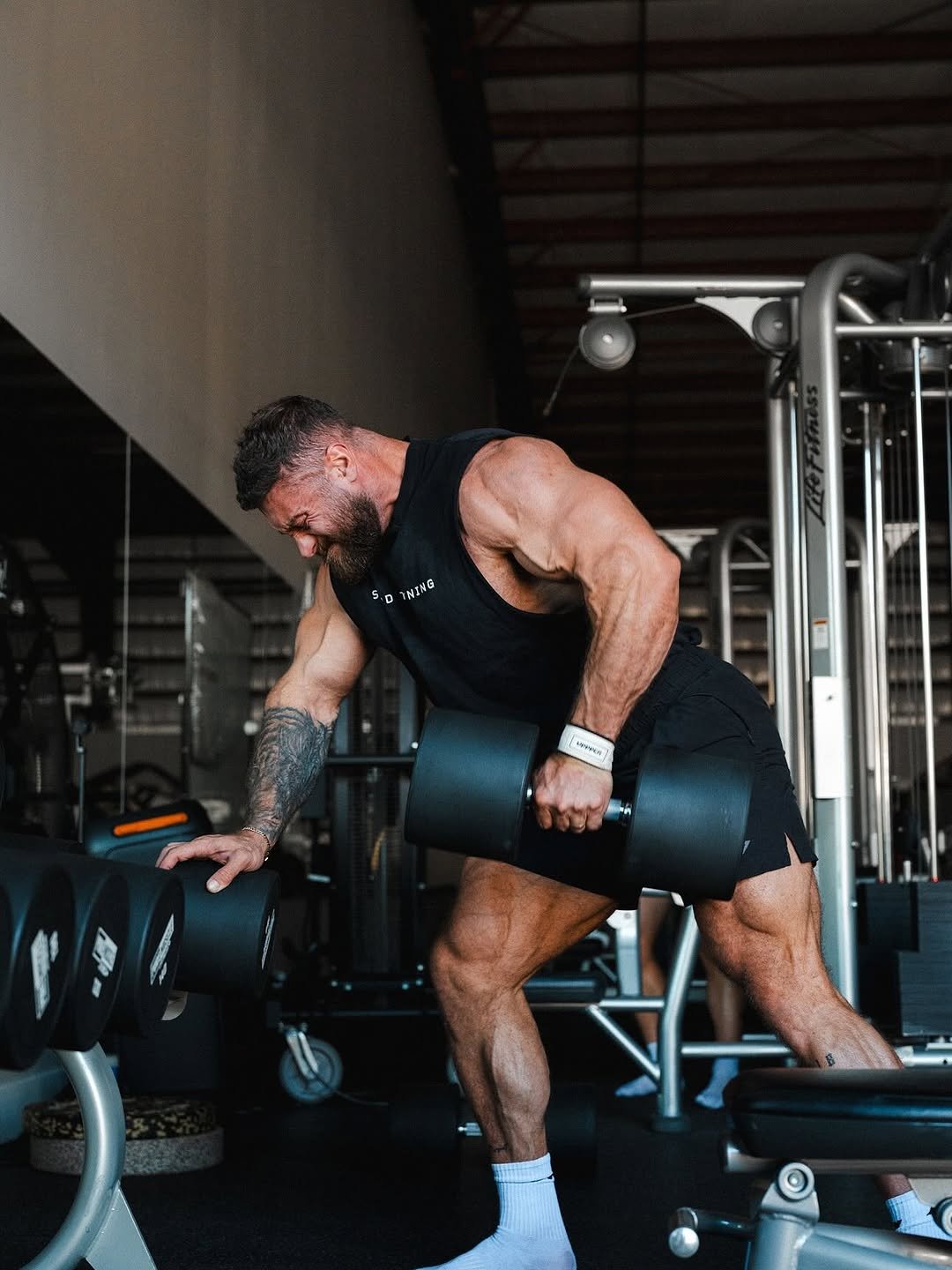 Photo shared by Chris Bumstead on November 12, 2025 tagging @karlykreative. May be an image of one or more people, biceps, people bodybuilding, activewear, barbell, dumbbell and text.