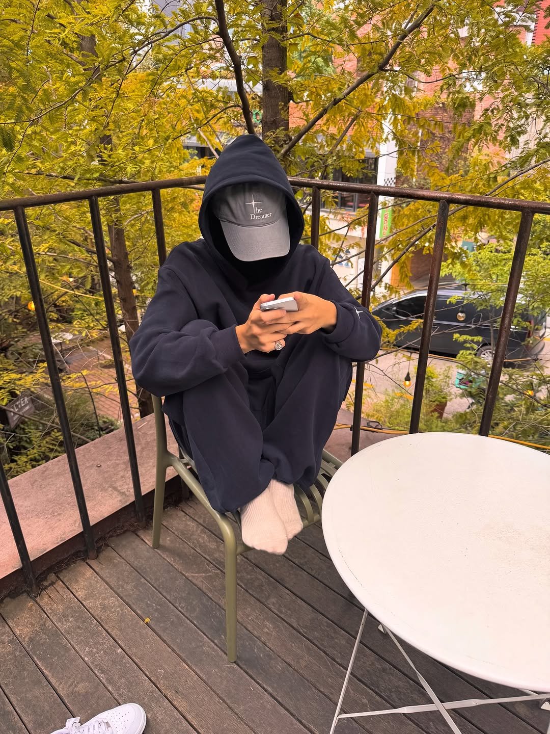 Photo by 은우 Eunwoo on September 08, 2025. May be an image of sweatshirt, face mask, sweatsuit, parka, sweatpants and gas mask.