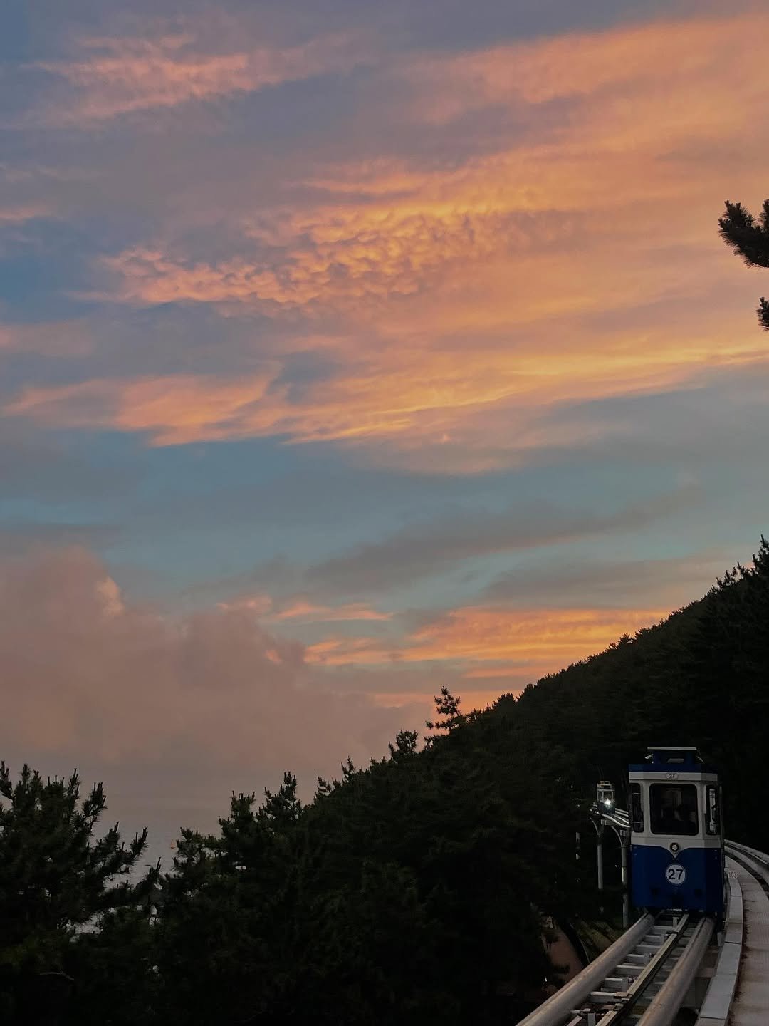 Photo by 최은우 on August 02, 2025. May be an image of twilight, cloud, suspension bridge and text.