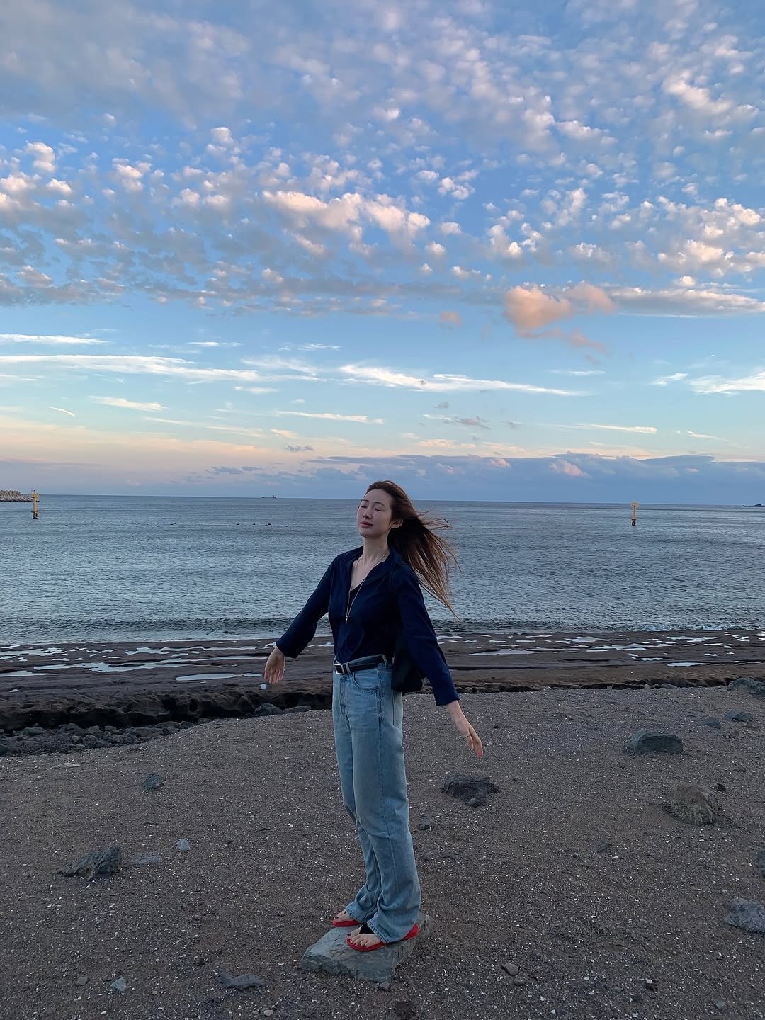 Photo by 차정원 on September 21, 2025. May be an image of 1 person, ocean and text.
