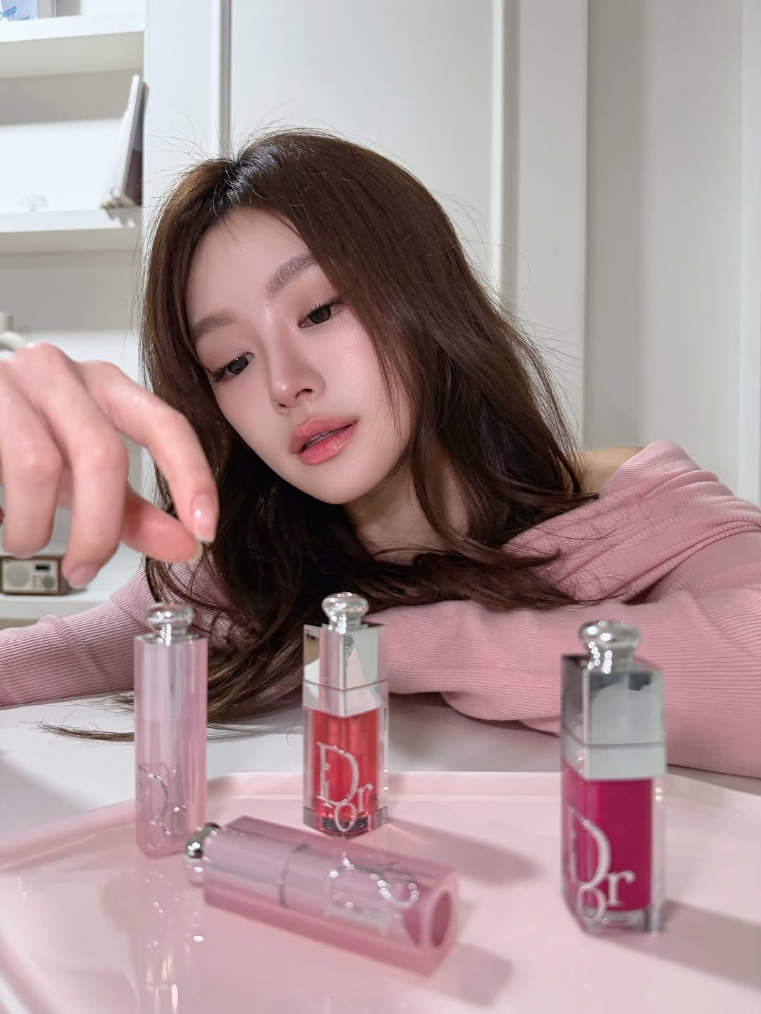 Photo shared by 손채현 SonChaeHyun on February 13, 2026 tagging @diorbeauty. May be an image of one or more people, lipstick, makeup, lighter, fragrance, bottle, perfume and text.