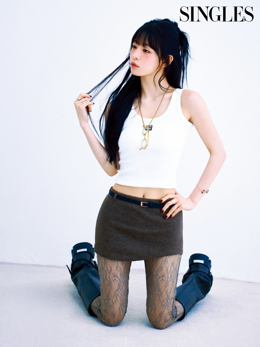 Photo shared by 이채영 on February 24, 2026 tagging @da_yooni, and @ijxxh_ouioui. May be an image of tights, miniskirt, fishnet stockings and text that says 'SINGLES'.