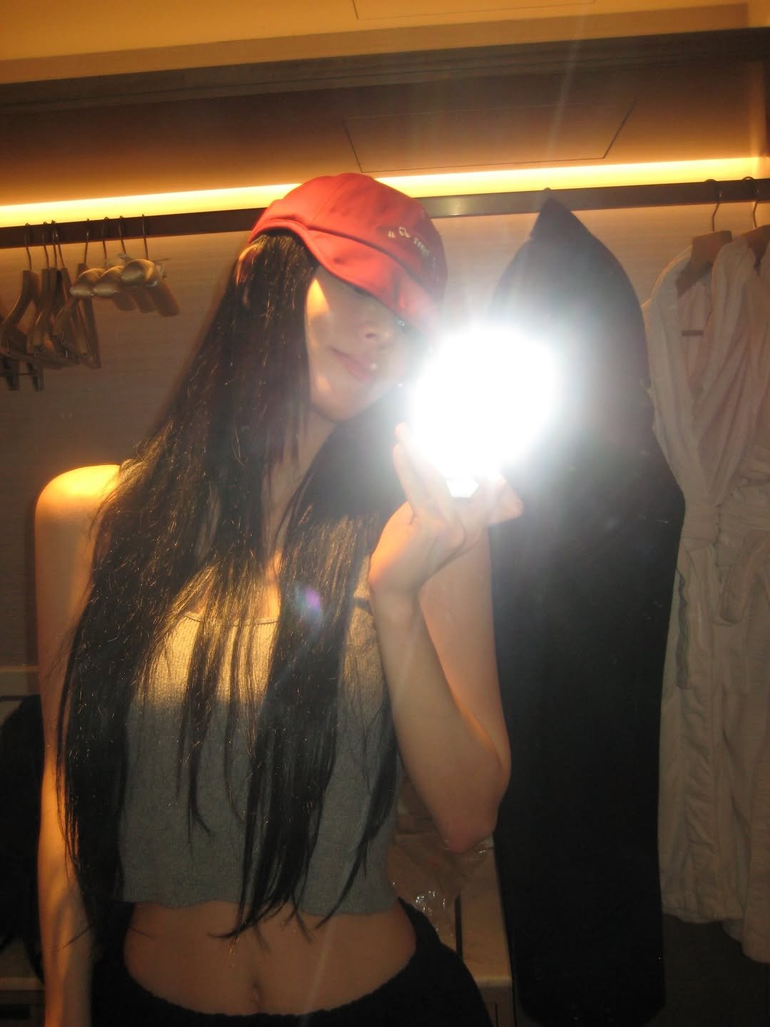 Photo by 이채영 on January 18, 2026. May be a selfie of one or more people, long hair, activewear, hat, phone, sweatpants, mirror and text.