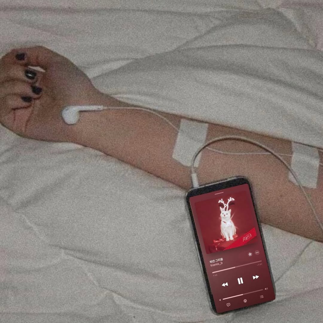 Photo by 이채영 on December 04, 2025. May be an image of phone, bandage, cigarette and text.