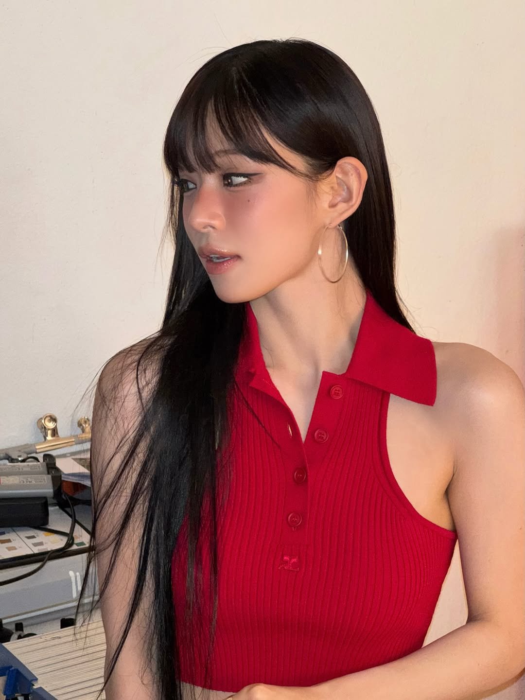 Photo by 이채영 on November 18, 2025. May be an image of one or more people, bangs, makeup, turtleneck, top and text.