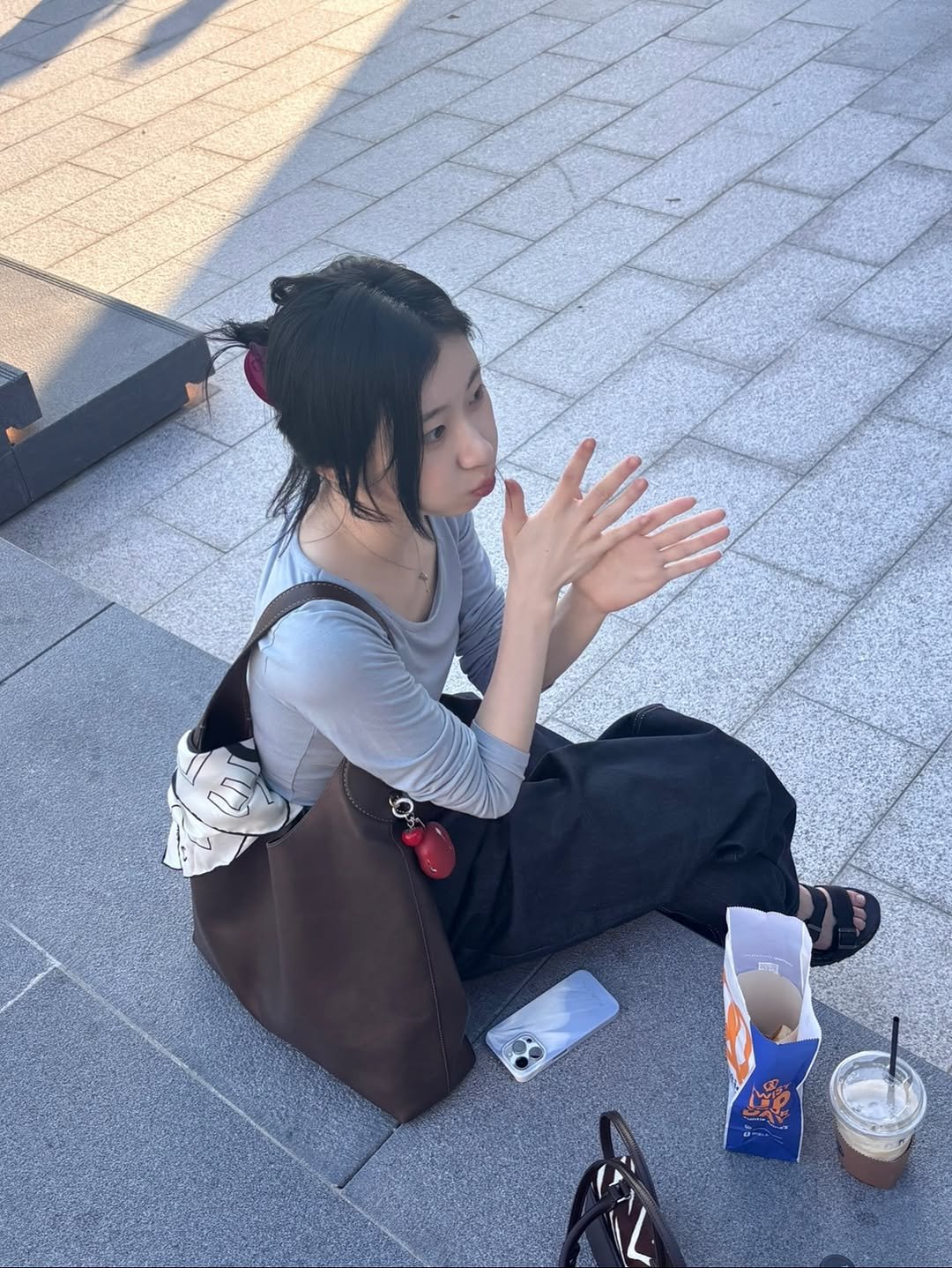 Photo by CHAERYEONG on September 21, 2025. May be an image of 1 person, cigarette, cornflower and text.