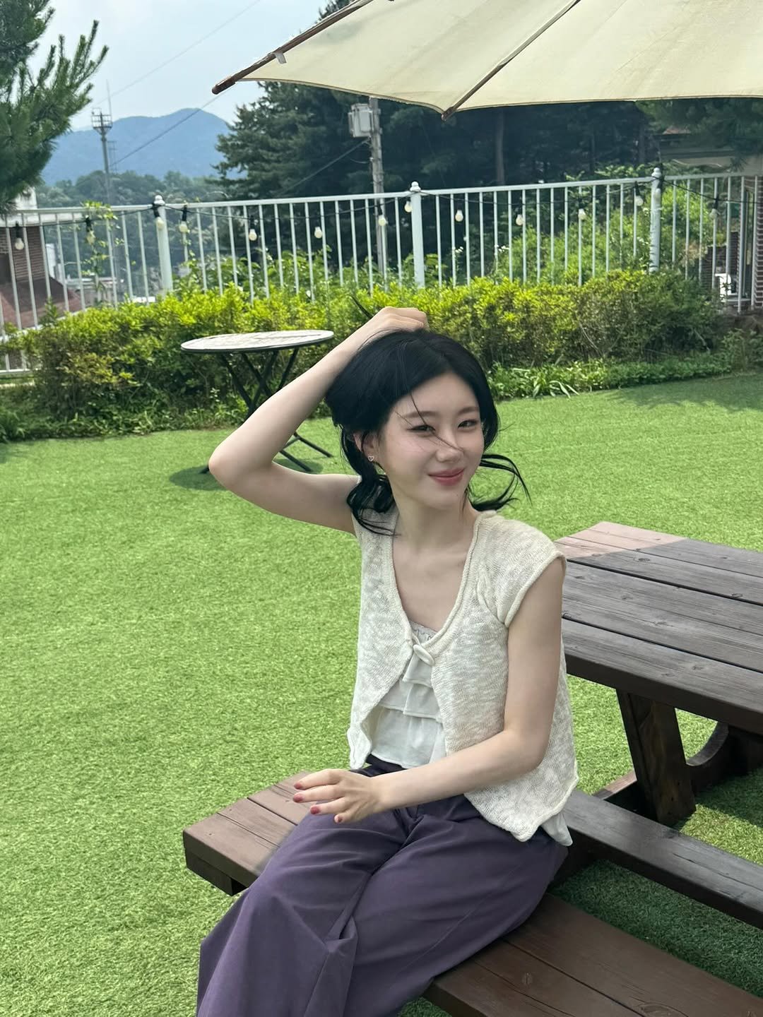 Photo by CHAERYEONG on July 17, 2025. May be an image of one or more people, hair, grass and picnic.