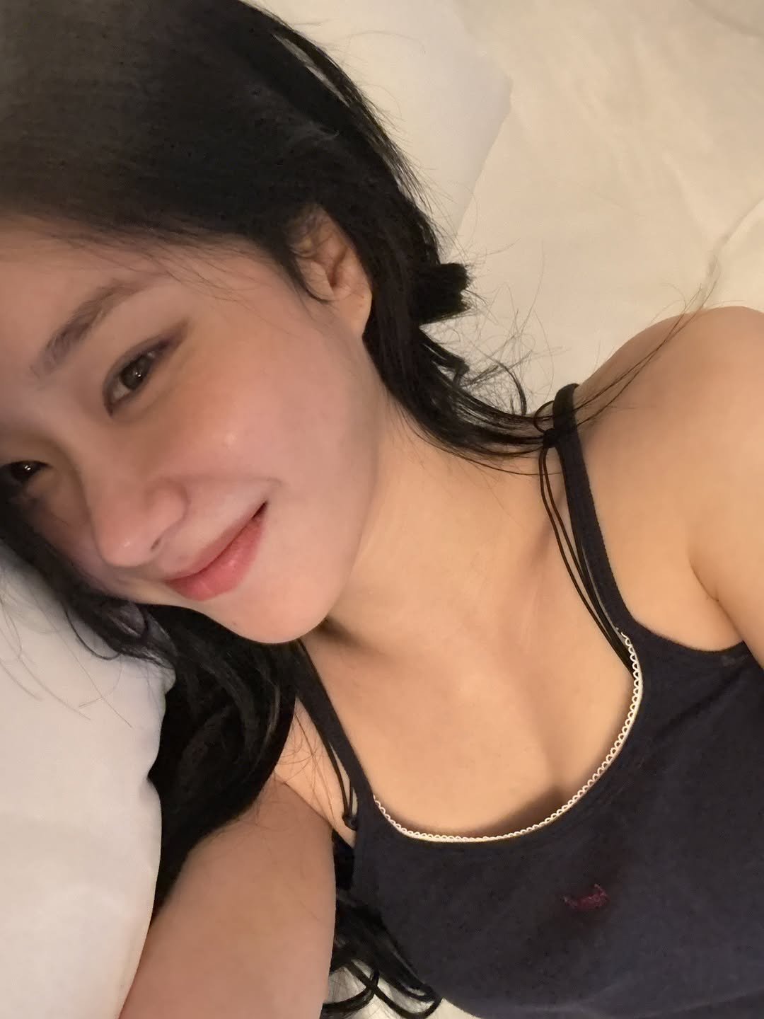 Photo by CHAERYEONG on July 30, 2025. May be a selfie of one or more people, hair, people smiling, sleepwear, bed, bedroom and text.